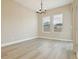 Bright living room features hardwood floors, recessed lights, and modern ceiling fan at 5254 Citrus Leaf Blvd, Winter Garden, FL 34787