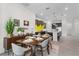 Elegant dining room adjacent to the kitchen, perfect for Gathering meals and entertaining guests at 5393 Red Coral Cir, Mount Dora, FL 32757