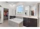 Luxurious main bathroom with a soaking tub, double vanities, and a walk-in closet at 5393 Red Coral Cir, Mount Dora, FL 32757