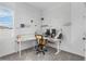 Modern office space with custom pegboard walls and bright natural light, creating a functional and inspiring workspace at 5393 Red Coral Cir, Mount Dora, FL 32757