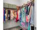 Spacious walk-in closet with organized shelving and plenty of hanging space at 5393 Red Coral Cir, Mount Dora, FL 32757