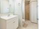 Bathroom with vanity, tile floors, toilet and stand up shower at 6042 Bolling Dr, Orlando, FL 32808