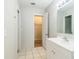 Bathroom with vanity, tile floors, toilet and stand up shower at 6042 Bolling Dr, Orlando, FL 32808