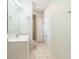 Bathroom with vanity, tile floors, toilet and stand up shower at 6042 Bolling Dr, Orlando, FL 32808
