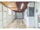 Spacious garage with concrete floors, a utility sink, and a garage door at 6042 Bolling Dr, Orlando, FL 32808