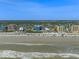 Expansive aerial view shows beachside condos and community features with beach access and views at 611 S Atlantic Ave # 4212, New Smyrna Beach, FL 32169