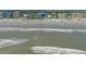 Beautiful oceanfront condos line the beach with waves crashing gently on the shore at 611 S Atlantic Ave # 4212, New Smyrna Beach, FL 32169