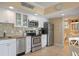 Updated kitchen with stainless steel appliances, and sleek countertops at 611 S Atlantic Ave # 4212, New Smyrna Beach, FL 32169