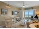 Cozy living room featuring tile floors, comfortable seating, and beach view at 611 S Atlantic Ave # 4212, New Smyrna Beach, FL 32169
