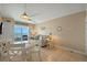 Living and dining areas feature an open floorplan and a balcony with ocean views at 611 S Atlantic Ave # 4212, New Smyrna Beach, FL 32169