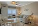 Living and dining areas feature an open floorplan and a balcony with ocean views at 611 S Atlantic Ave # 4212, New Smyrna Beach, FL 32169
