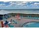 Poolside deck with plenty of lounge seating and ocean views at 611 S Atlantic Ave # 4212, New Smyrna Beach, FL 32169