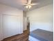 The bedroom offers wood-look floors and ample closet space at 6730 Orlando Drive, Indian Lake Estates, FL 33855