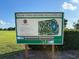 A detailed welcome sign and course map is displayed at the Indian Lake Estates Golf & Country Club at 6730 Orlando Drive, Indian Lake Estates, FL 33855