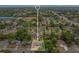 This aerial shot highlights the property's location within a serene and lush neighborhood at 6820 Ambassador Dr, Orlando, FL 32818