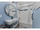 Bathroom boasts modern sink and vanity with a tub and shower in the background at 72 Fairway Cir, Umatilla, FL 32784