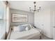 Bright bedroom features a stylish trundle bed and serene decor at 734 Longboat Dr, Davenport, FL 33896