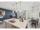 Inviting open-concept kitchen with a large island and ample seating, perfect for entertaining at 734 Longboat Dr, Davenport, FL 33896
