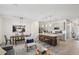 Bright open-concept living area seamlessly connects dining space to the kitchen at 734 Longboat Dr, Davenport, FL 33896