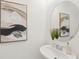 Stylish powder room with sleek vessel sink and modern fixtures at 734 Longboat Dr, Davenport, FL 33896