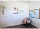 Cozy bedroom nook with comfortable seating and decorative shelves at 7509 Mourning Dove Cir # 203, Reunion, FL 34747