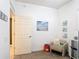 This is a cozy bedroom featuring carpeted floors and ocean-themed decor at 7509 Mourning Dove Cir # 203, Reunion, FL 34747