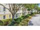 Charming condo building with well-maintained grounds, perfect for a peaceful and relaxing lifestyle at 7509 Mourning Dove Cir # 203, Reunion, FL 34747