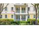 Beautiful condo with white shutters and a charming balcony, perfect for enjoying the outdoors at 7509 Mourning Dove Cir # 203, Reunion, FL 34747