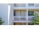 Inviting condo exterior with a charming entrance, perfect for welcoming guests and enjoying the community vibe at 7509 Mourning Dove Cir # 203, Reunion, FL 34747