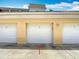 Detached garage with parking spots for vehicles at 7509 Mourning Dove Cir # 203, Reunion, FL 34747
