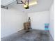 Spacious garage interior with ample room for storage and organization at 7509 Mourning Dove Cir # 203, Reunion, FL 34747