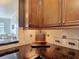 Close up of granite countertops and decorative backsplash at 7509 Mourning Dove Cir # 203, Reunion, FL 34747