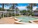 Beautiful community fountain surrounded by manicured landscaping and palm trees at 7509 Mourning Dove Cir # 203, Reunion, FL 34747