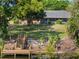 Enjoy lake access from this lovely home with dock and lush landscaping at 7540 Lake Marsha Dr, Orlando, FL 32819