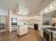 Bright eat-in kitchen with built in appliances, island, and lots of cabinet space at 7540 Lake Marsha Dr, Orlando, FL 32819