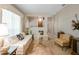 Cozy living room with neutral tones, comfortable seating, and plenty of natural light at 7540 Lake Marsha Dr, Orlando, FL 32819