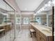 The main bathroom features dual vanity sinks, a makeup counter, and a soaking tub at 7540 Lake Marsha Dr, Orlando, FL 32819