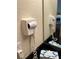 Bathroom features mounted hair dryers for convenience at 8101 Resort Village Dr # 3909, Orlando, FL 32821