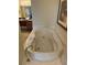 Large soaking tub with hydrotherapy jets, perfect for a relaxing spa experience at home at 8101 Resort Village Dr # 3909, Orlando, FL 32821