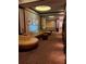 Inviting hallway seating area features stylish decor and comfortable furniture at 8101 Resort Village Dr # 3909, Orlando, FL 32821