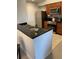 Kitchen with stainless steel appliances and a breakfast bar at 8101 Resort Village Dr # 3909, Orlando, FL 32821
