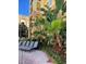 Relaxing poolside with comfortable lounge chairs and lush tropical landscaping at this resort-style property at 8101 Resort Village Dr # 3909, Orlando, FL 32821