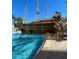 Amazing pool with a pirate ship water feature for Gathering fun and resort-style relaxation at 8101 Resort Village Dr # 3909, Orlando, FL 32821