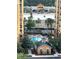 View of the pool and commercial area from the condominium complex at 8101 Resort Village Dr # 3909, Orlando, FL 32821