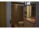 Cozy bathroom features a glass shower and vanity cabinet with sink at 859 Morning Star Dr, Lakeland, FL 33810