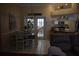 Light-filled dining area with table, chairs and doors that lead to outdoor patio at 859 Morning Star Dr, Lakeland, FL 33810