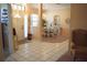 Bright foyer with tile flooring leading to the formal dining area at 859 Morning Star Dr, Lakeland, FL 33810