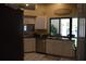 Well-maintained kitchen featuring ample counter space and natural light at 859 Morning Star Dr, Lakeland, FL 33810