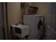 Convenient laundry room with utility sink and washer-dryer at 859 Morning Star Dr, Lakeland, FL 33810