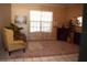 Cozy living room with carpeted floors, fireplace, and comfortable seating at 859 Morning Star Dr, Lakeland, FL 33810